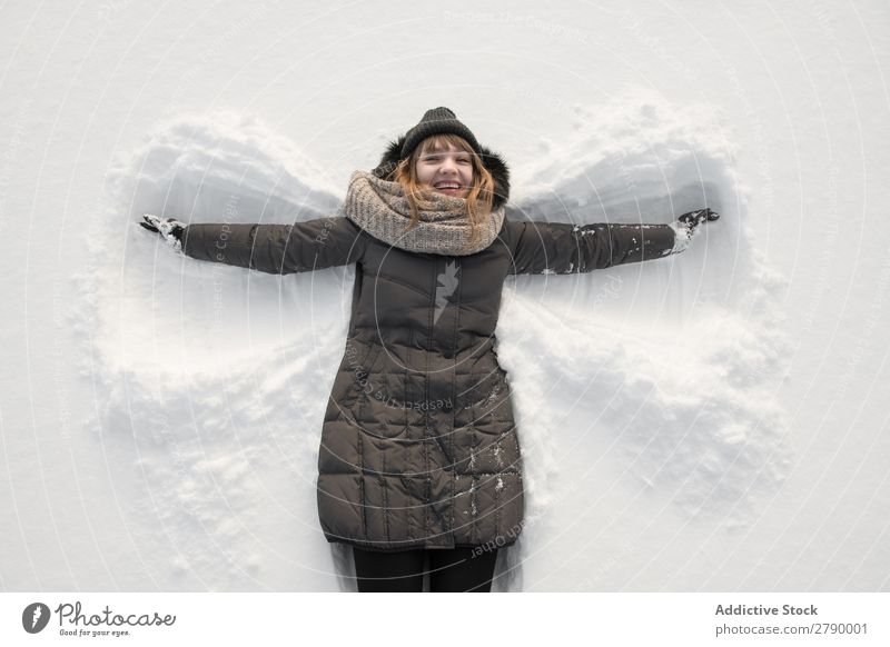 Woman in winter wear making snow angel Snow Angel Winter Wear Lie (Untruth) Vilnius Lithuania Playing Field having fun Cloth Lady Youth (Young adults) outfit