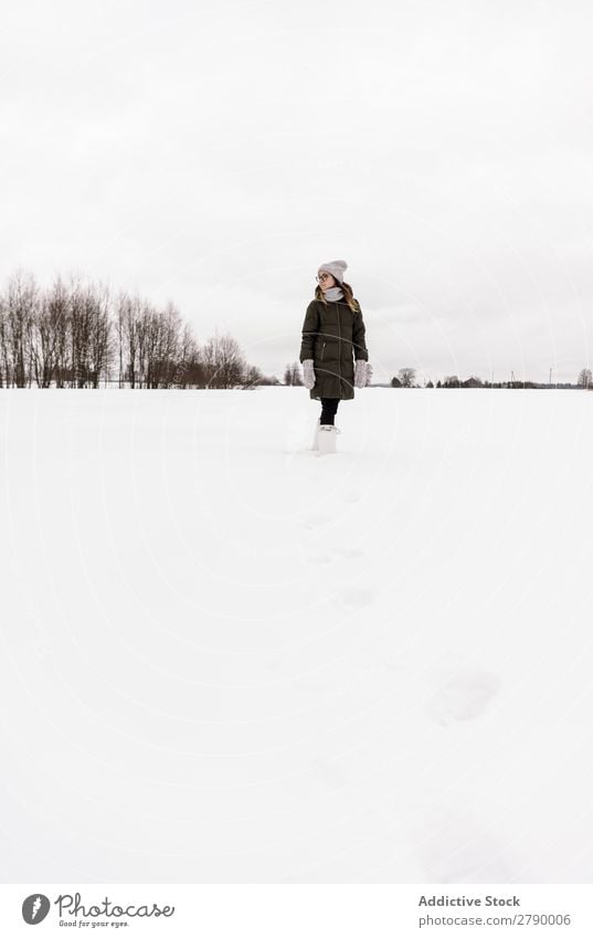 Woman jumping between snow field Snow Field Winter Vilnius Lithuania having fun Wear Youth (Young adults) Lady Meadow Sky Clouds Cold Nature Happiness Seasons