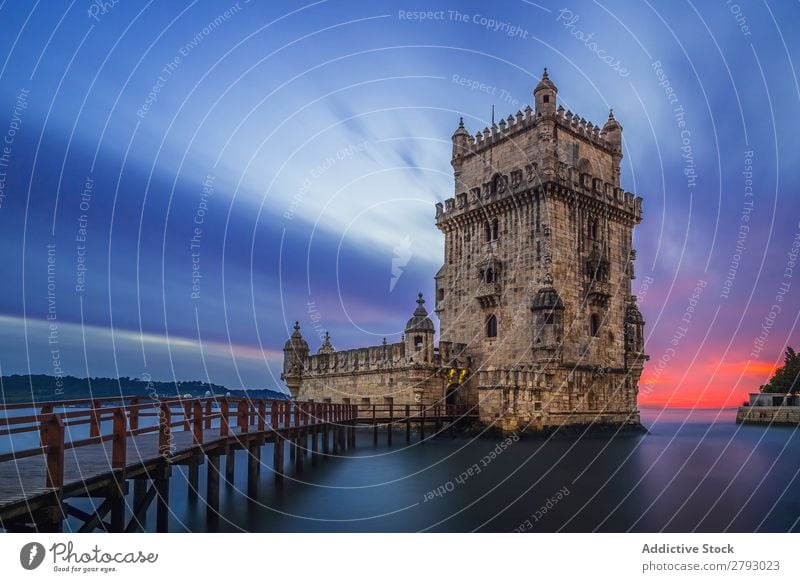 Medieval stone tower in dusky seascape Tower medieval Ocean Fortress Nature Sunset Architecture Landscape River Long exposure Old Monument Vacation & Travel Sky