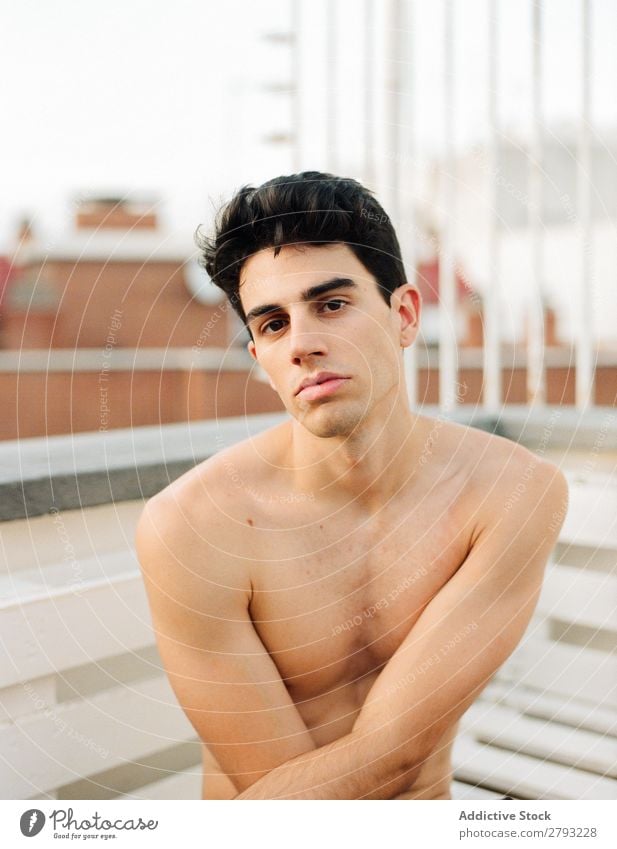 Young man sitting on balcony Man Guy Balcony Fresh Youth (Young adults) Brunette Sit shirtless Hair and hairstyles hairdo Naked Torso Creativity conceptual