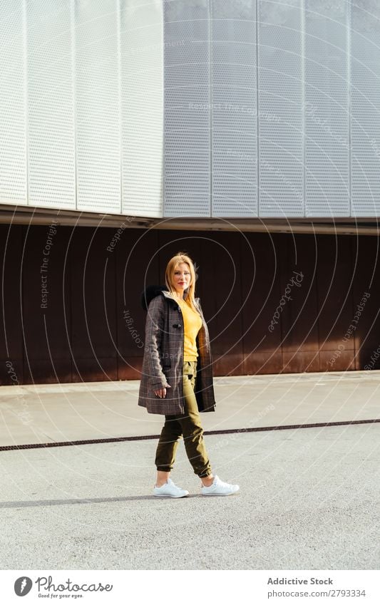 Blonde girl walking in the cityv Woman Fashion Girl Street City Beautiful Walking Model Youth (Young adults) Beauty Photography Yellow Style Cute Exterior shot
