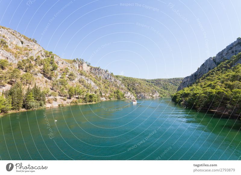 RIVER ESTUARY TO SKRADIN Watercraft Calm Considerable Cloudless sky Coast Croatia Flow Idyll Landscape Vantage point Mountain Nature Card River Rock Sailing