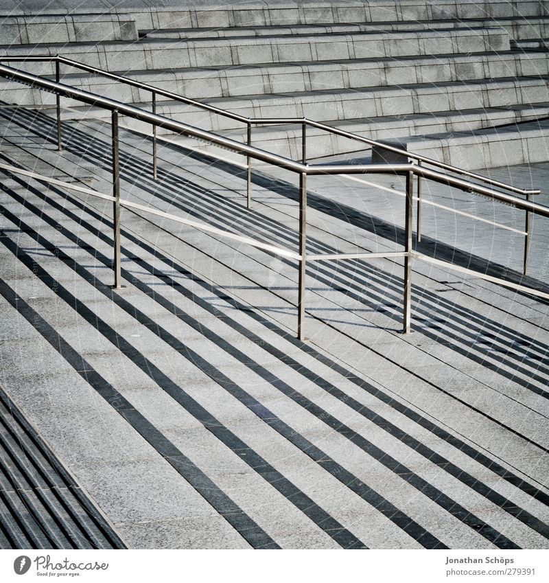 Staircase(s) Stairs Town Banister Handrail Gray Concrete Gloomy Descent Tilt Midday sun Line Geometry Structures and shapes Structural change Stripe Abstract