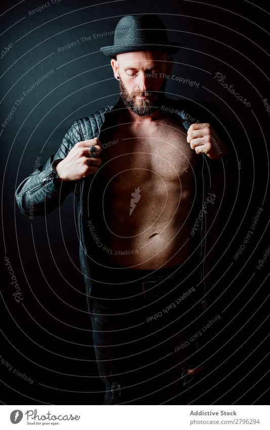 Young shirtless bearded guy in leather jacket Man Leather jacket Hipster Youth (Young adults) Adjust Hat Guy handsome Cool (slang) Style Easygoing Studio shot
