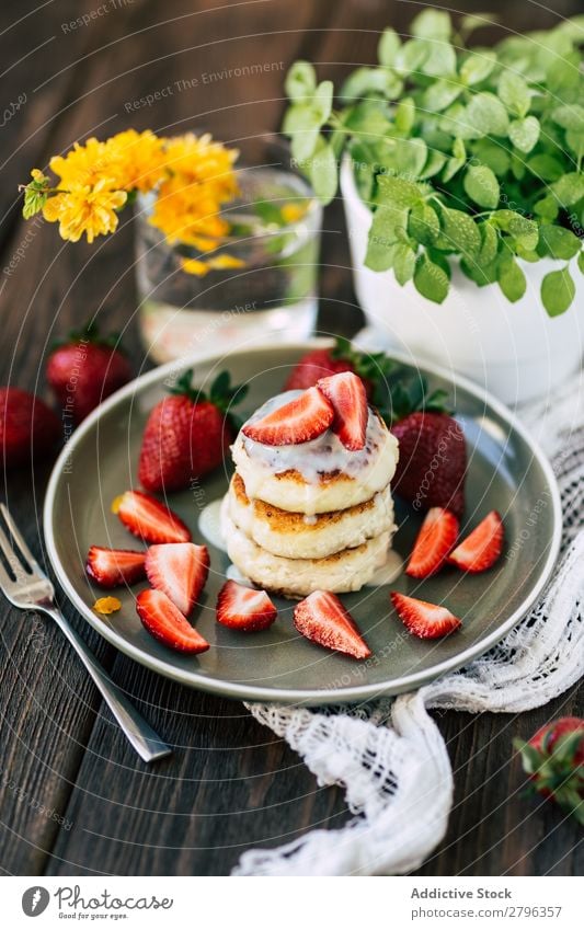 Tasty pancakes with strawberries Pancake Rocks Strawberry Plate Table Flower Plant Pot Food Breakfast Dessert Sweet Delicious Meal Stack Gourmet Morning Snack