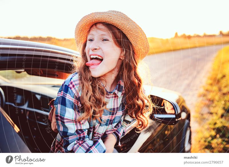 happy child girl looking out the car window Lifestyle Joy Leisure and hobbies Vacation & Travel Trip Adventure Freedom Expedition Summer Hiking Child Infancy