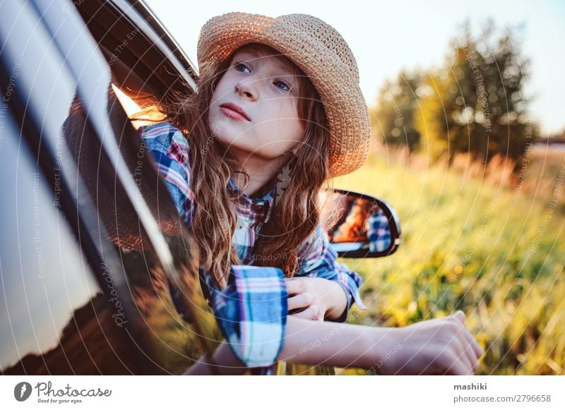 happy child girl looking out the car window Lifestyle Joy Leisure and hobbies Playing Vacation & Travel Trip Adventure Freedom Expedition Summer Hiking Child