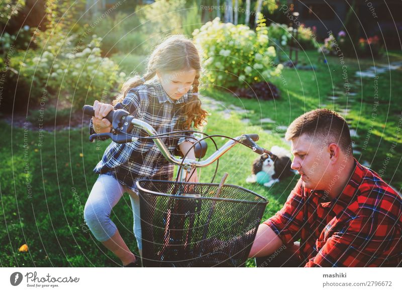 father and daughter fixing problems with bicycle outdoor Lifestyle Happy Leisure and hobbies Vacation & Travel Summer Sports Parenting Child School Tool Man