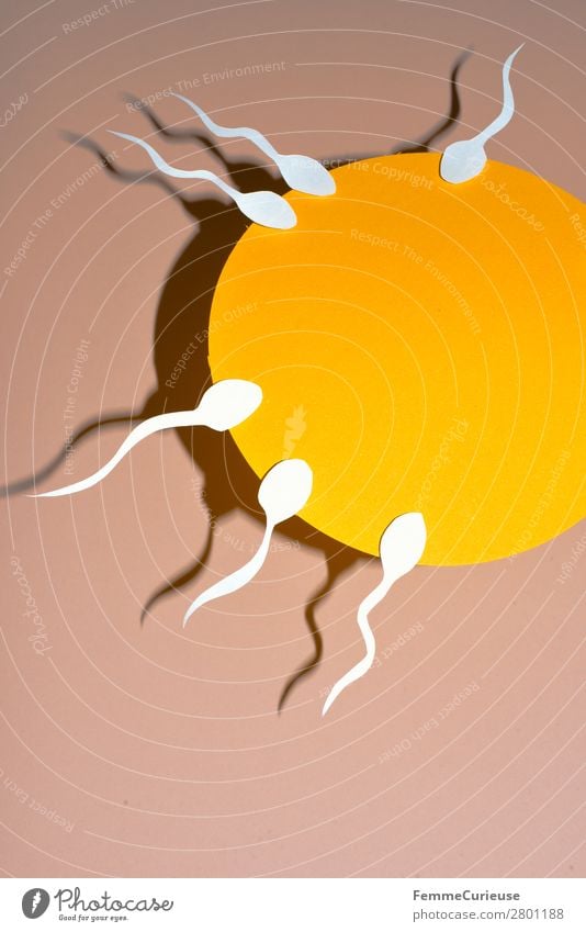 Reproduction - Sperm swimming to egg cell Sign Sex Sexuality Caught by a speed camera Drop shadow Yellow White Egg cell Fertilization Biology Fertile