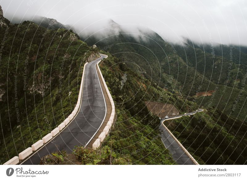 Mountain roads on foggy day Street Fog Vantage point Vacation & Travel Nature playa norte Spain Landscape Asphalt scenery Winding Trip Highway Clouds Weather