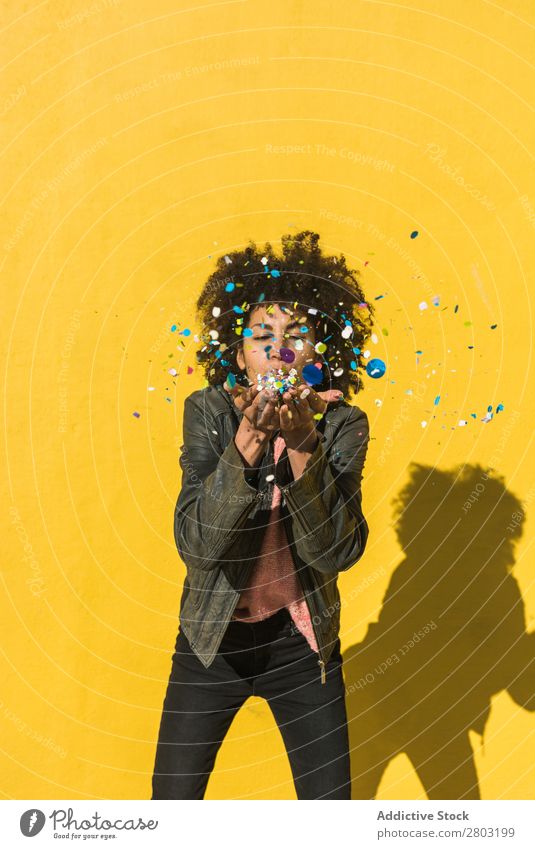 Black woman with afro hair celebrating with confetti. African Afro Background picture Beautiful Beauty Photography Birthday Blue Guest Feasts & Celebrations