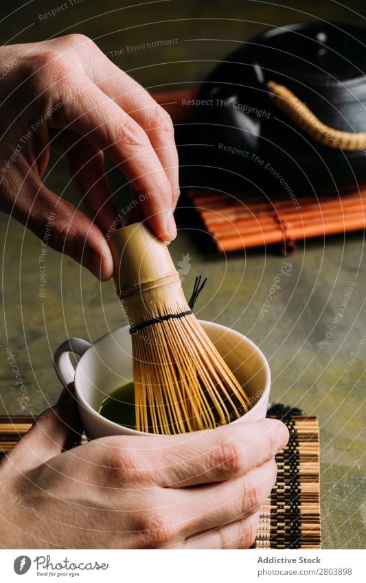 Preparing matcha tea Powder Wood Hand Herbs and spices Man Cup Drinking Tea Beater Scoop Japanese Teapot assorted Green Healthy Beverage Dark Water brew Bamboo