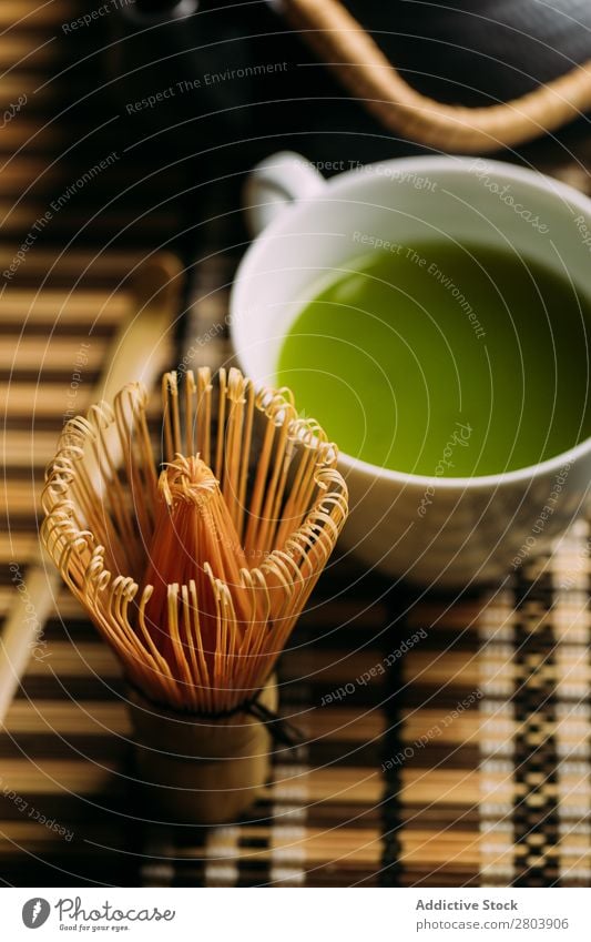 Preparing matcha tea assorted Bamboo Beverage brew Cup Dark Drinking Green Healthy Herbs and spices Japanese Powder Scoop Spoon Tea Teapot Water Beater Wood