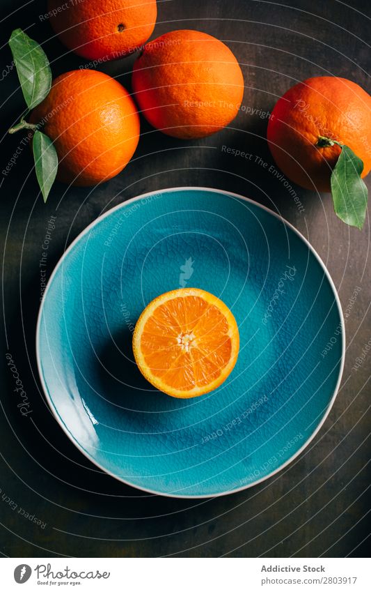 Fresh orange in a teal plate Healthy citrus Juicy Background picture Fruit Orange Green Delicious Meal Dessert Still Life Plant Eating California Acid Dish