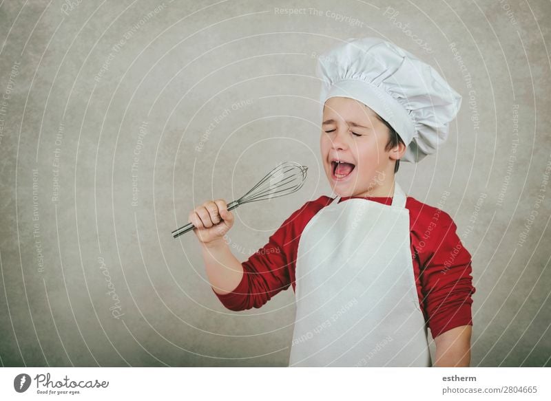 funny boy with cook hat holding the whisk in one hand Nutrition Dinner Diet Lifestyle Music Restaurant Child Profession Gastronomy Business Human being