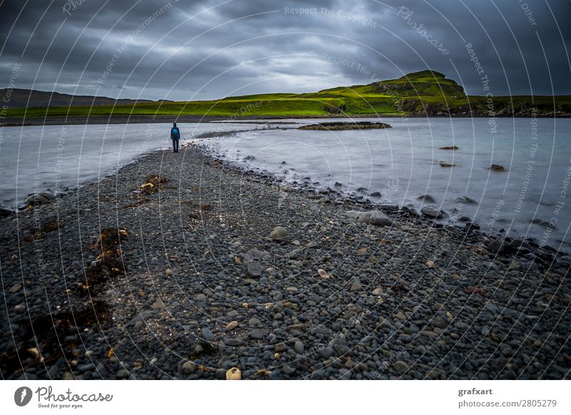 person on coast at low tide on the Isle of Skye in Scotland Adventure Loneliness Individual Movement Low tide Emotions High tide Torrents of water Threat
