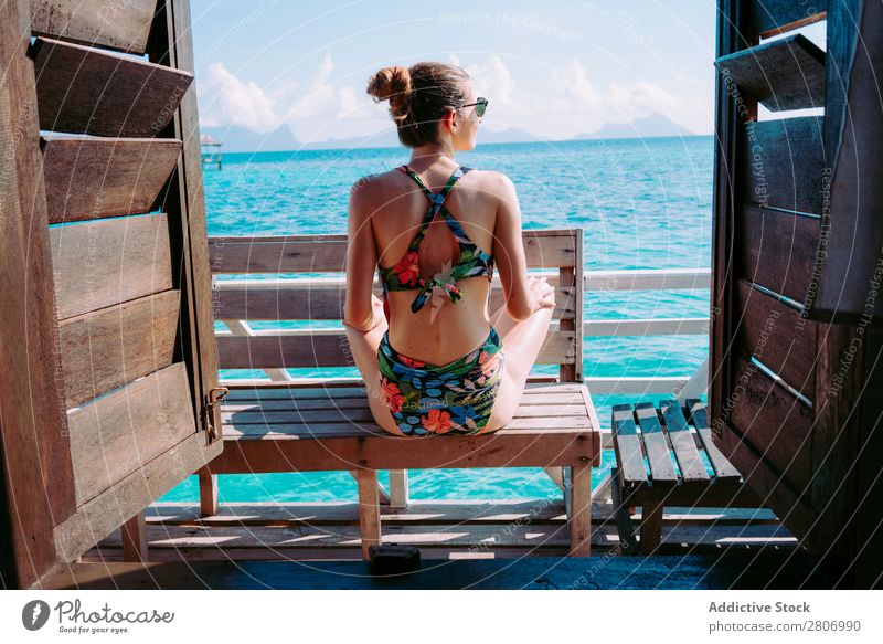 Woman in bikini sitting on bench near water Bikini Ocean Bench Water Jamaica Sunglasses Swimsuit Seat Blue Tropical Exotic Sit Accessory Summer Thin Lady