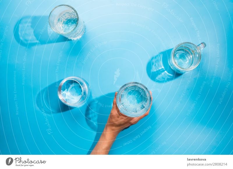 Woman's hands holding a cup of clean sparkling water Reflection Healthy Fresh Cool (slang) Pure Blue Bright Transparent Elements Drop Environment