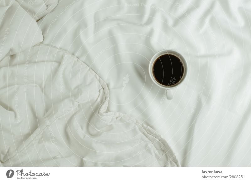 Cup of coffee in bed on white sheets Beverage Autumn flat lay Breakfast Warmth Cozy Copy Space Close-up Home Blanket Duvet Bedroom Coffee Cloth Textiles