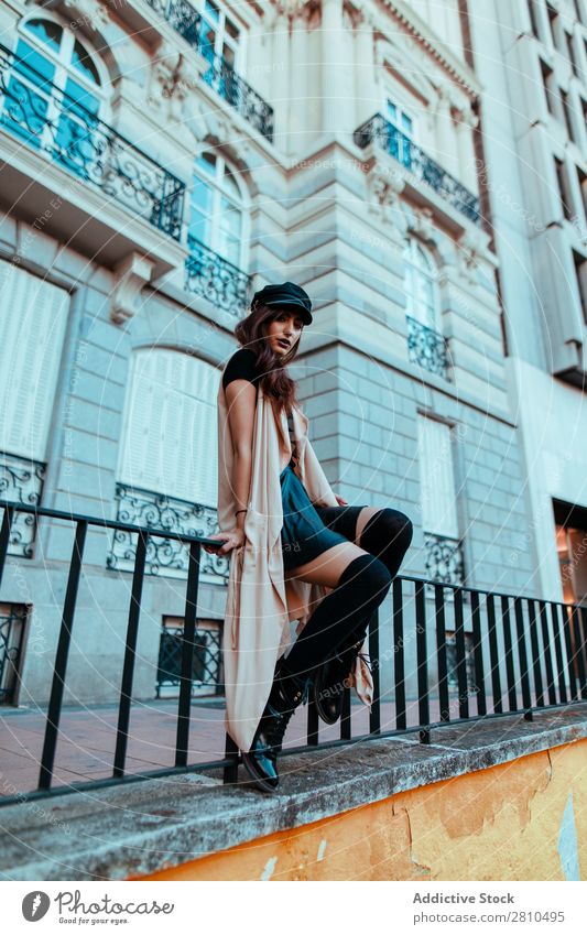 Stylish young woman at handrail Woman Style Youth (Young adults) Street Fence Handrail Building Beautiful City Fashion pretty Attractive Model Human being