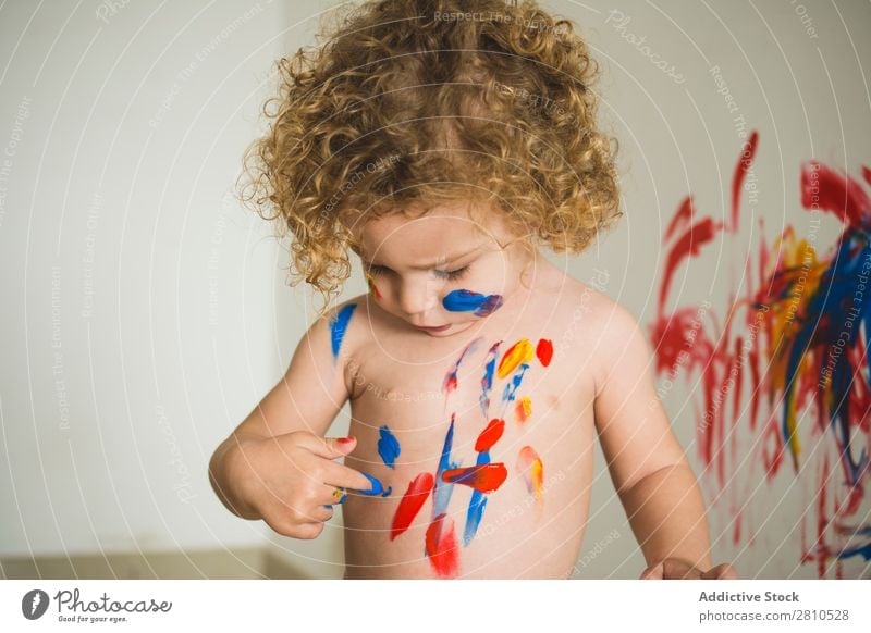 Child getting dirty with paints Painting (action, artwork) Small Draw Delightful Bright Body Art Drawing Infancy Colour Joy Artist Painter Education Cute