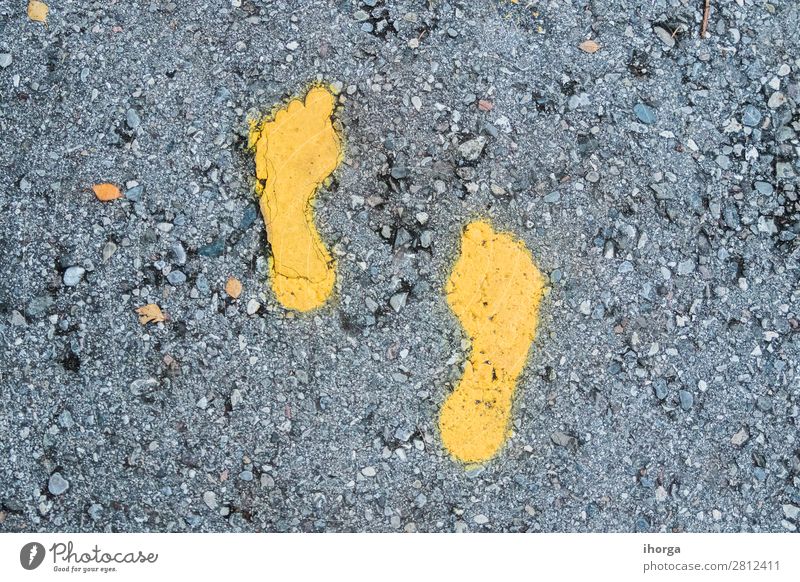 Yellow footprint signs on the floor for pedestrian Lifestyle Leisure and hobbies Vacation & Travel Trip Adventure Feet Nature Park Pedestrian Street