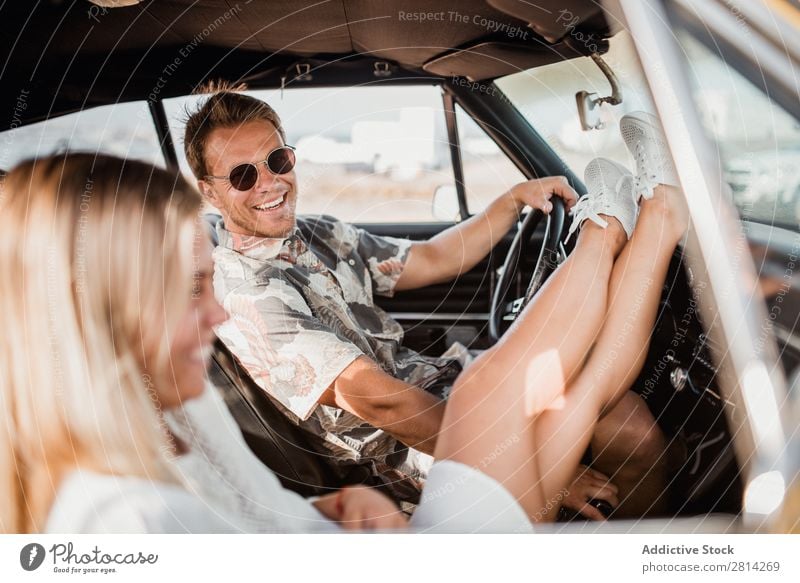 Smiling couple in car Couple Car Love Sunglasses Looking into the camera Sit Joy Happy Cheerful Cool (slang) Style Hip & trendy Vehicle Man Woman Lifestyle