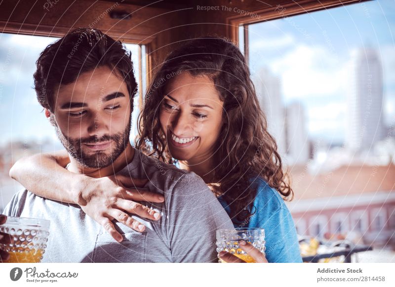 Romantic young couple looking at window Relationship City Window Smiling handsome Leisure and hobbies Guy disposable Attractive In pairs Sit Beverage Restful