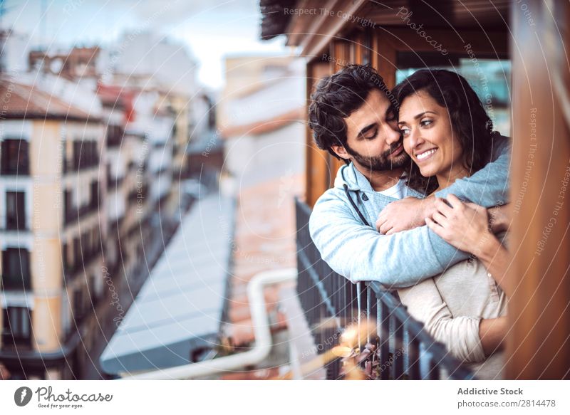 Romantic young couple at window Relationship City Window Smiling handsome Leisure and hobbies Guy disposable Attractive In pairs Sit Beverage Restful Drinking