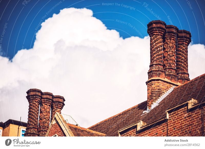 Brick chimney over clouds. Chimney Clouds London Sky England Architecture Building Roof fancy Europe Great Britain English Old Structures and shapes