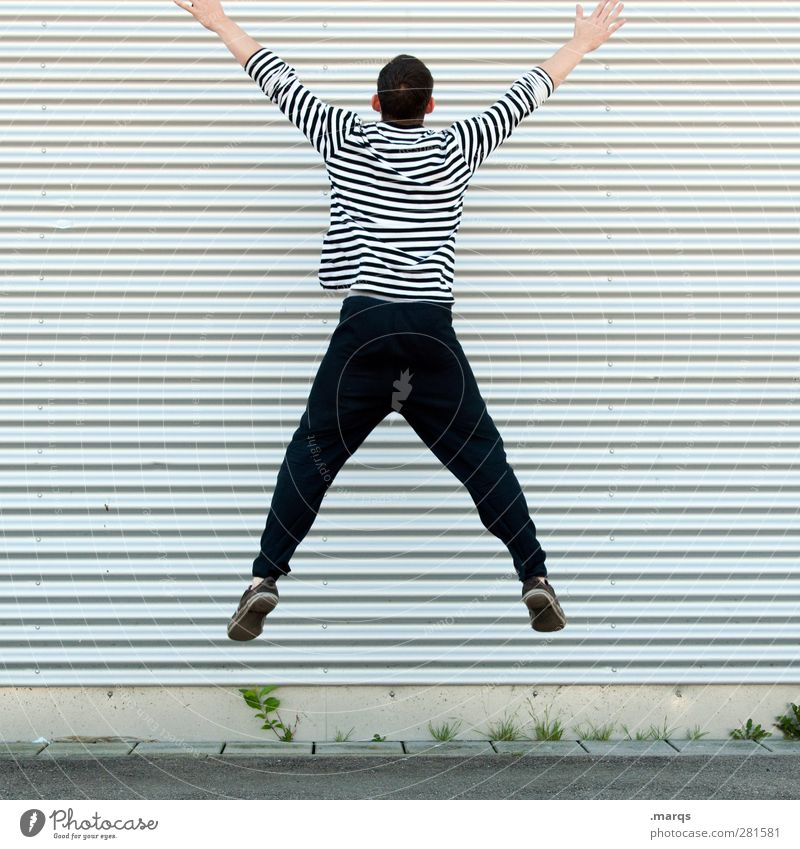 against the wall Human being Masculine Young man Youth (Young adults) Body 1 30 - 45 years Adults Wall (barrier) Wall (building) Facade Line Stripe Jump