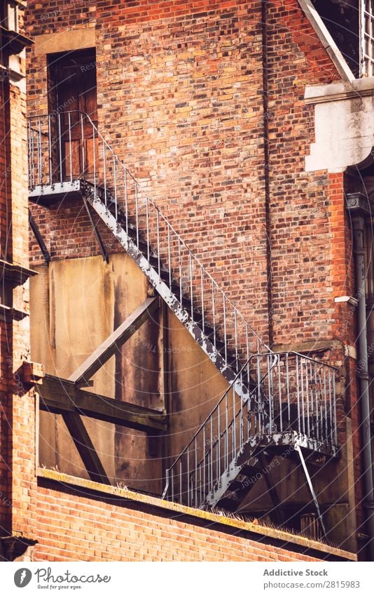 Fire ladder outside old building - a Royalty Free Stock Photo from