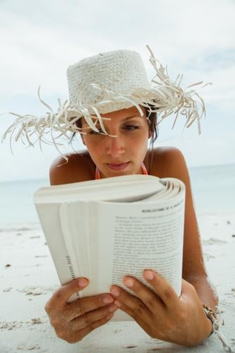 beach-reading-crazy Woman Human being Beach Vacation & Travel Reading Book Education Portrait photograph Hat Sunhat Relaxation Break Summer Produce Study Novel
