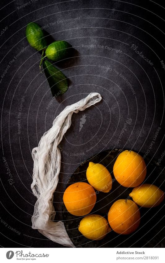Fresh lemons and oranges on dark table Lemon Orange citrus Fruit Food Background picture Diet Green Healthy Natural Organic Raw Agriculture Mature Table