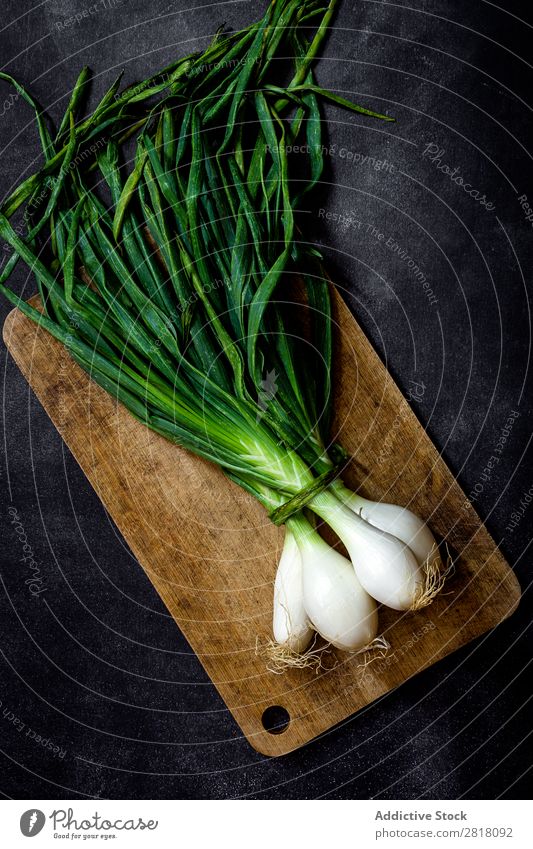Fresh onions on dark table Fruit Food Background picture Diet Green Healthy Natural Organic Raw Agriculture Mature Table Bird's-eye view Vegetable
