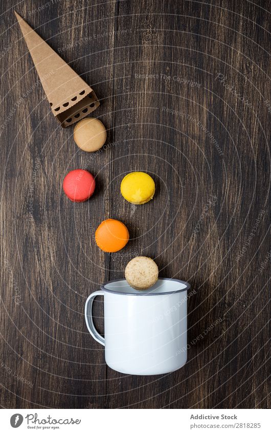Tasty french macarons on a wooden table Macaron Food Table Deserted Dessert Snack Yellow Cake Chocolate Gourmet biscuit Wood French Colour Multicoloured