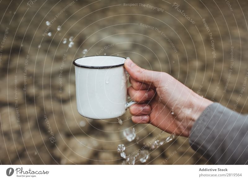 Hand splashing water from cup Splashing Water Cup Clean Healthy pouring Fresh Drop Drinking Liquid Purity Clear Wet Refreshment Washing Transparent Environment