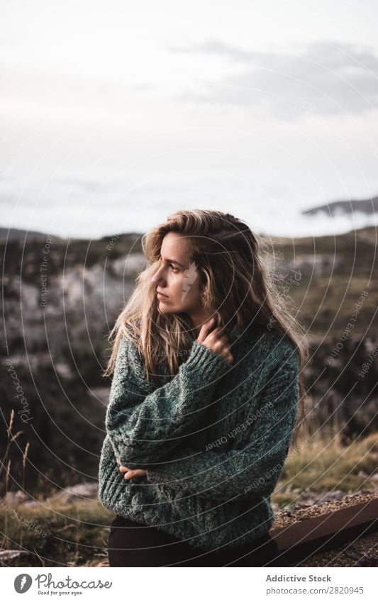 Woman sitting at roadside Roadside Sit Fence Mountain Fog Clouds Youth (Young adults) Blonde Street Transport Vacation & Travel Beautiful Wait pretty Earnest