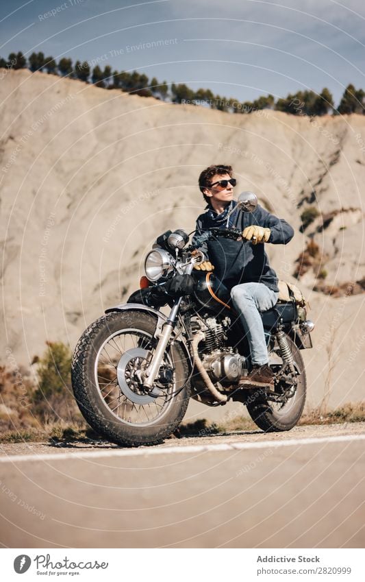 Man on bike looking away Bicycle Motorcycle Cool (slang) Looking away Roadside Motorcycling Transport Sunglasses Vehicle Lifestyle Vacation & Travel