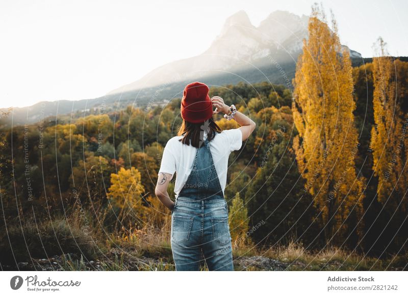 Woman in hat in nature Nature Walking Youth (Young adults) Human being Lifestyle Landscape Leisure and hobbies Adventure Freedom Seasons Autumn Tree