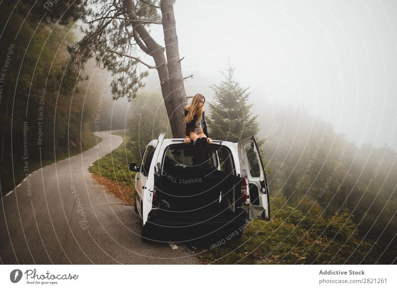 Woman sitting on top of car Top Car Nature Lifestyle Beautiful Vacation & Travel Youth (Young adults) Freedom Human being enjoyment Loneliness Atmosphere