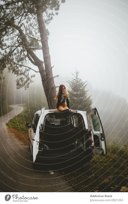 Woman sitting on top of car Top Car Nature Lifestyle Beautiful Vacation & Travel Youth (Young adults) Freedom Human being enjoyment Loneliness Atmosphere