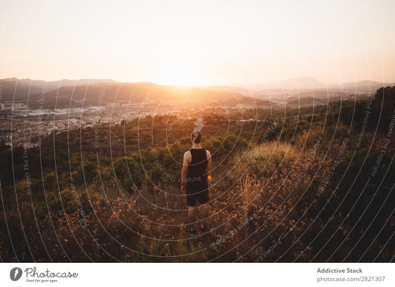 Anonymous man posing in plain Man Landscape Field Sunset Nature Summer Meadow Action Rural Environment Adventure Leisure and hobbies Evening Natural Sunrise Sky