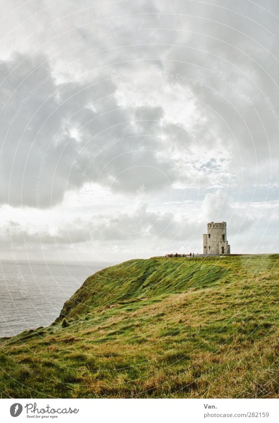 country's end Nature Landscape Water Sky Clouds Grass Waves Coast Ocean Cliff Ireland Tower Manmade structures Cliffs of Moher Gray Green Colour photo