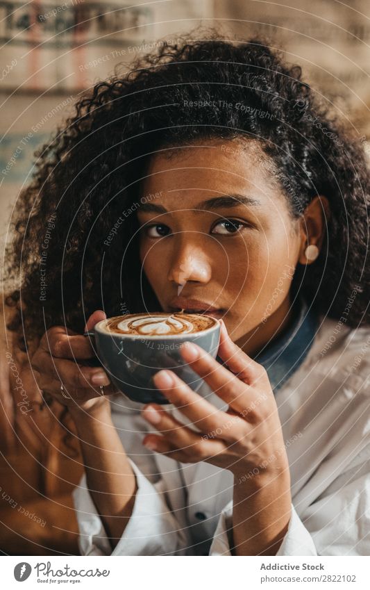 Woman drinking cup of coffee Beautiful Ethnic Black Youth (Young adults) African Stir Coffee Cup latte Brunette Attractive Human being Beauty Photography Adults