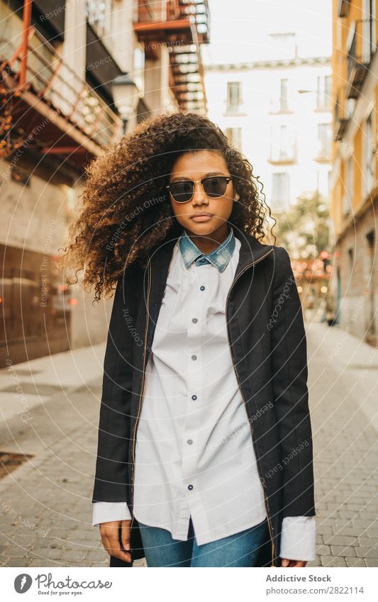 Stylish woman on street Woman pretty Beautiful Ethnic Black Curly African Youth (Young adults) Stand Street Sunglasses Brunette Attractive Human being