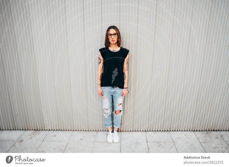 Stylish young woman standing at metal wall Woman Style Tattoo Street Beautiful Youth (Young adults) Fashion Hipster pretty Cool (slang) Beauty Photography