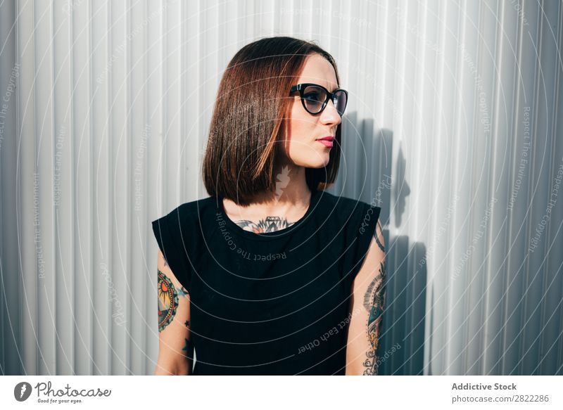 Stylish young woman standing at metal wall Woman Style Tattoo Street Beautiful Youth (Young adults) Sunglasses Fashion Hipster pretty Cool (slang)