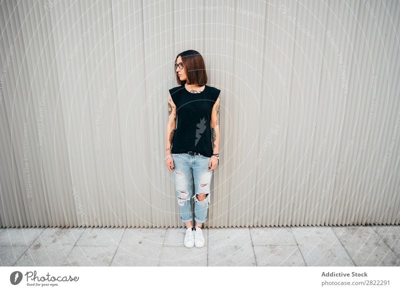 Stylish young woman standing at metal wall Woman Style Tattoo Street Beautiful Youth (Young adults) Fashion Hipster pretty Cool (slang) Beauty Photography
