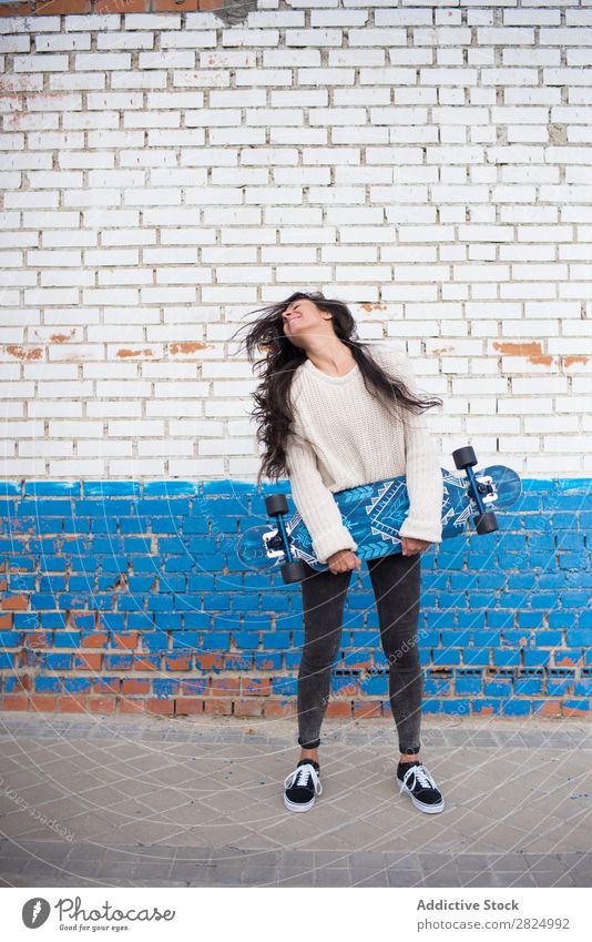 Brunette girl with longboard in the street Caucasian Town Board Cool (slang) Hip & trendy Woman 1 Coast Leisure and hobbies Girl Exterior shot Street Lifestyle